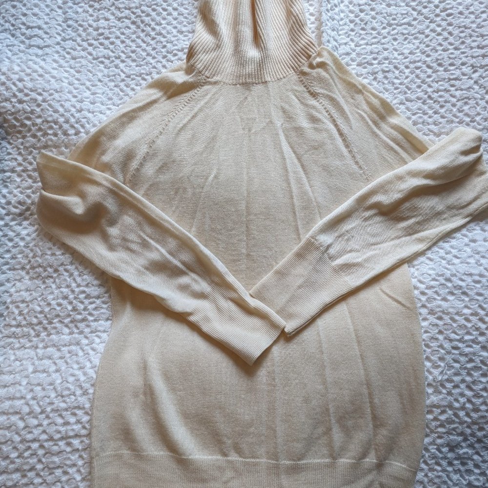 S J. Crew merino wool lightweight sweater in cream.